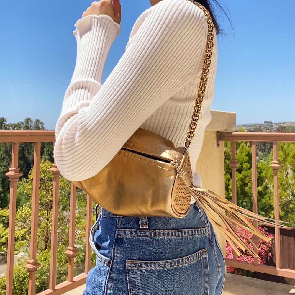 Metallic gold cylinder purse with chain